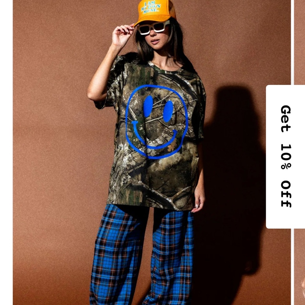 Dressed in LALA The World Needs Your Magic Oversized Camo Tee in Blue
